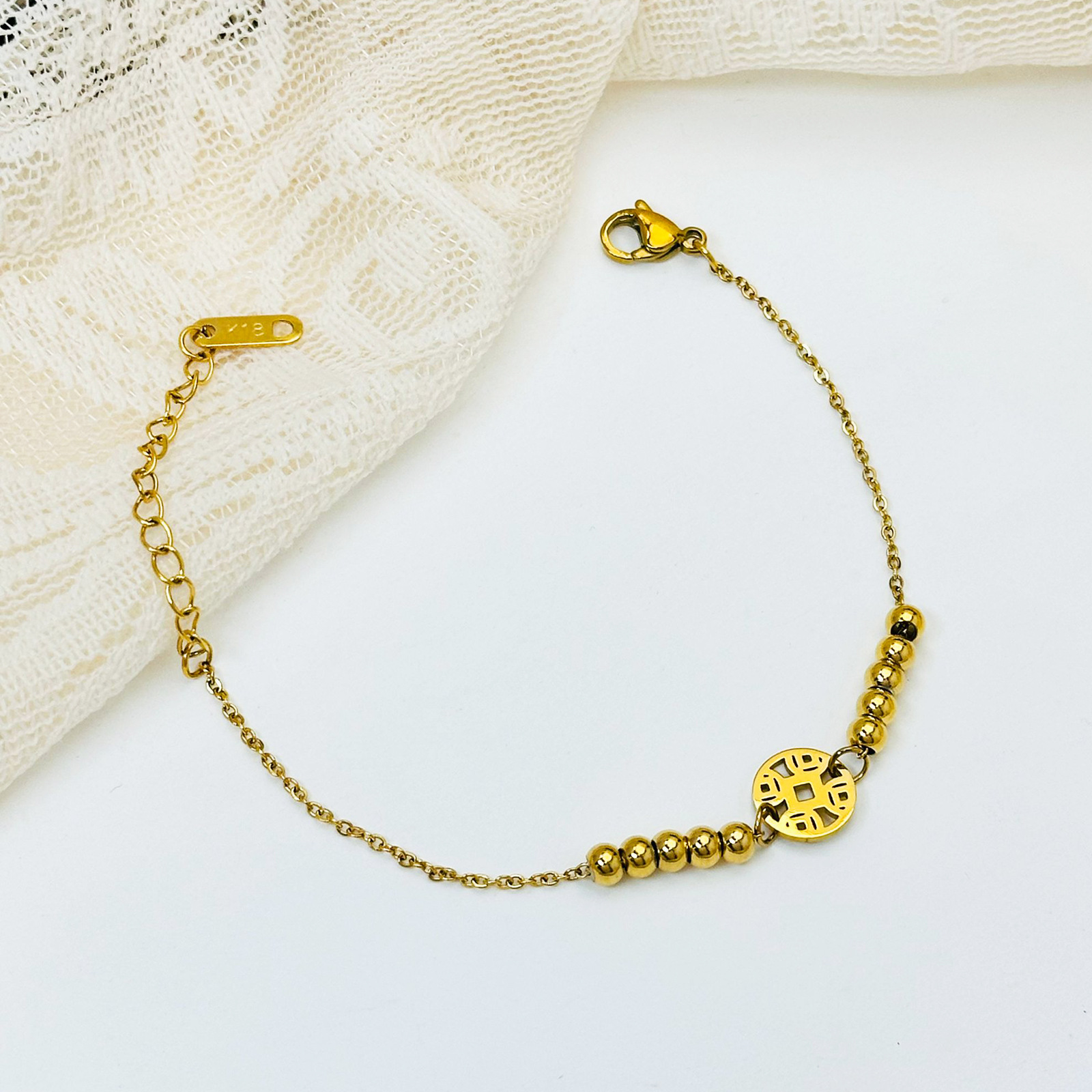 Joyas de diseño de oro de 18 quilates Fuxi pulsera de titanio ligera de lujo nicho colgante universal para mujeres ins