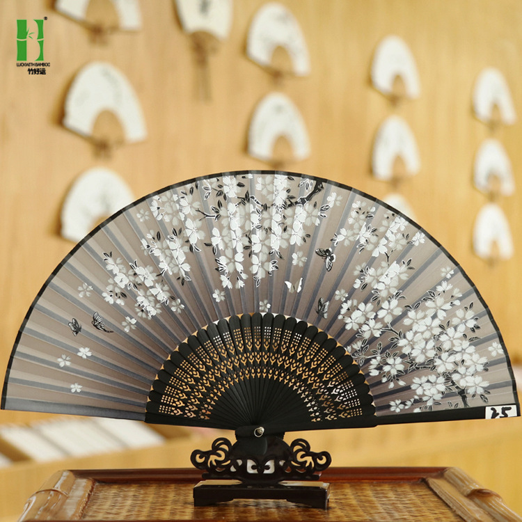 Ventilador antiguo estilo al por mayor Fan bolsa traje artesanía regalo ventilador cara de seda ventilador de publicidad estilo chino plegable ventilador femenino al por mayor