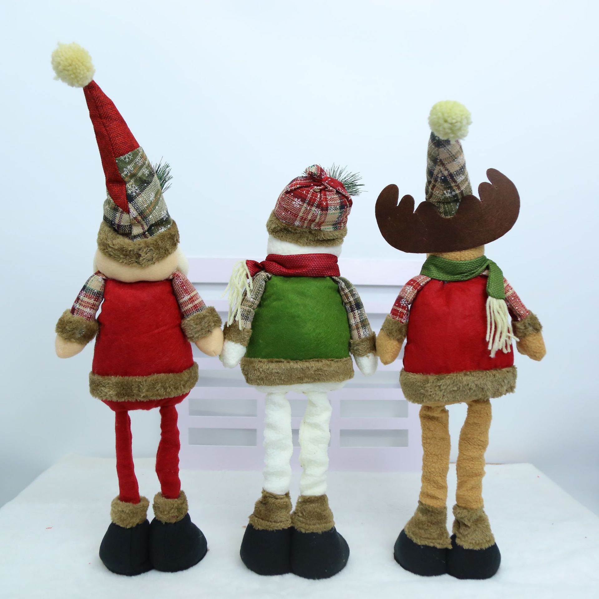 Navidad transfronteriza europea y americana rural retro tejido retráctil piernas viejos muñecas de nieve muñecas de alce adornos juguetes de peluche