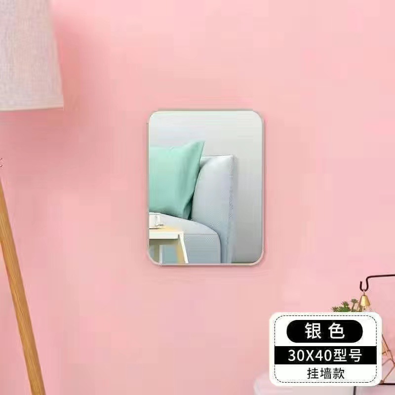 El espejo de vestir de la tienda de ropa es delgado y hermoso. Espejo de vestir súper blanco. Espejo de piso arqueado para tienda de ropa para mujeres.