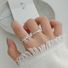 甜美鏤空愛心戒指女不規則編織蝴蝶結S925鍍銀開口指環疊戴食指戒