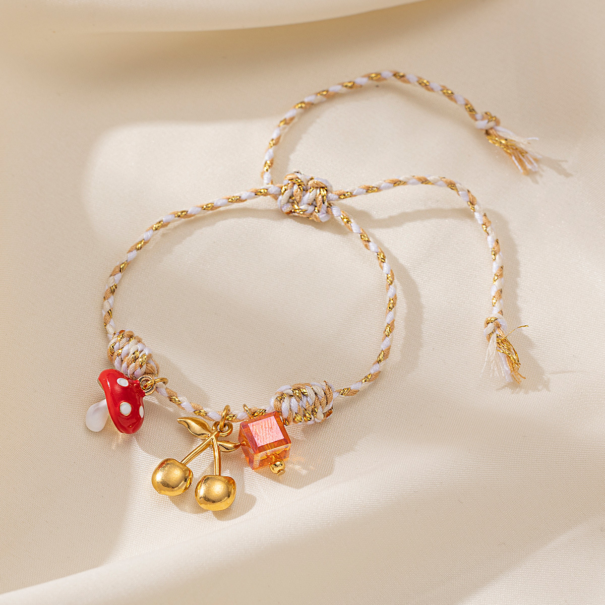 Tena Europa y América Colgante de acero inoxidable Mujer Pastoral Fruta Cereza Cuerda Tejida Pulsera Joyería de explosión transfronteriza simple