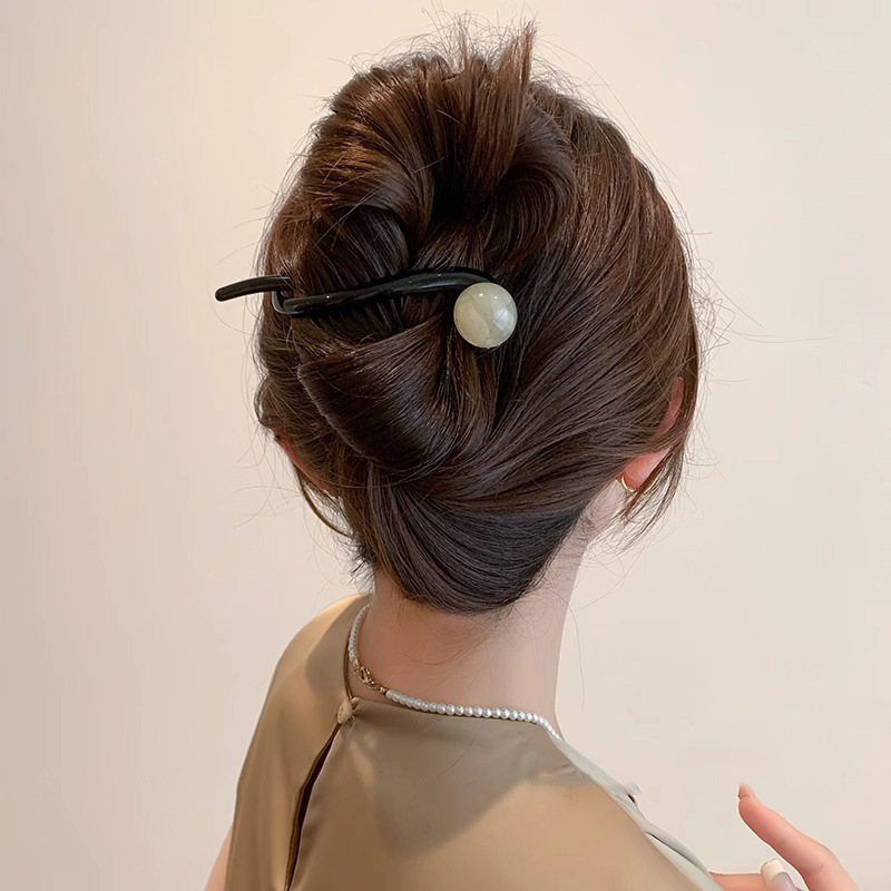 Simple perla clip de cabello para mujeres 2025 nuevo clip de cabello de alta calidad detrás de la cabeza torcida clip de cabello de una palabra tocado