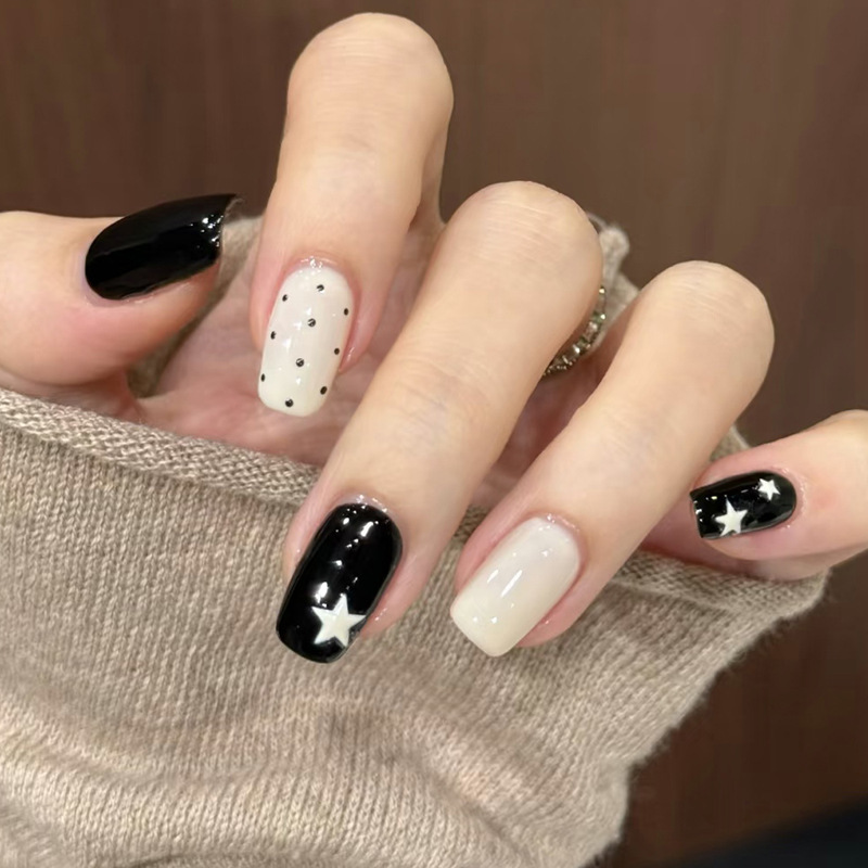 Trendy Short Press-On Nails in Sweet-Cool Style with Black and White Polka Dots and Stars, Nail Art for a Spicy Girl Vibe