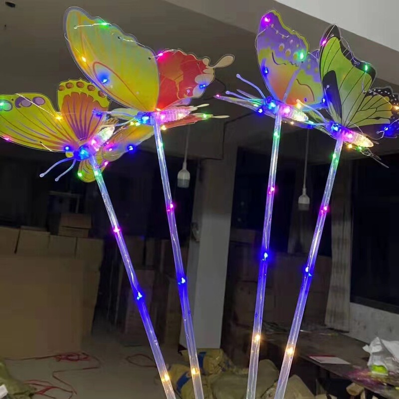 Factory direct new led simulation butterfly luminous toys to push the night market hot flash swing butterfly