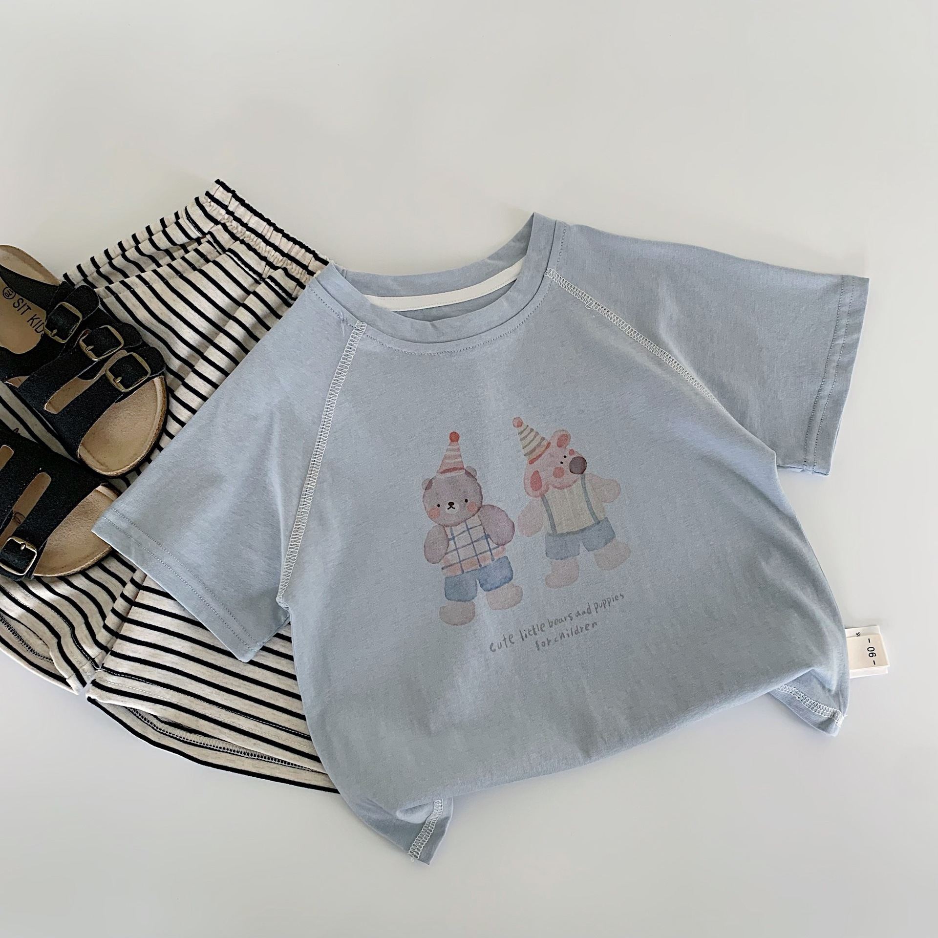 Maibao niños verano manga corta 2025 nuevos niños y niñas dibujos animados oso camiseta salvaje Huzhou Zhili ropa para niños clase a