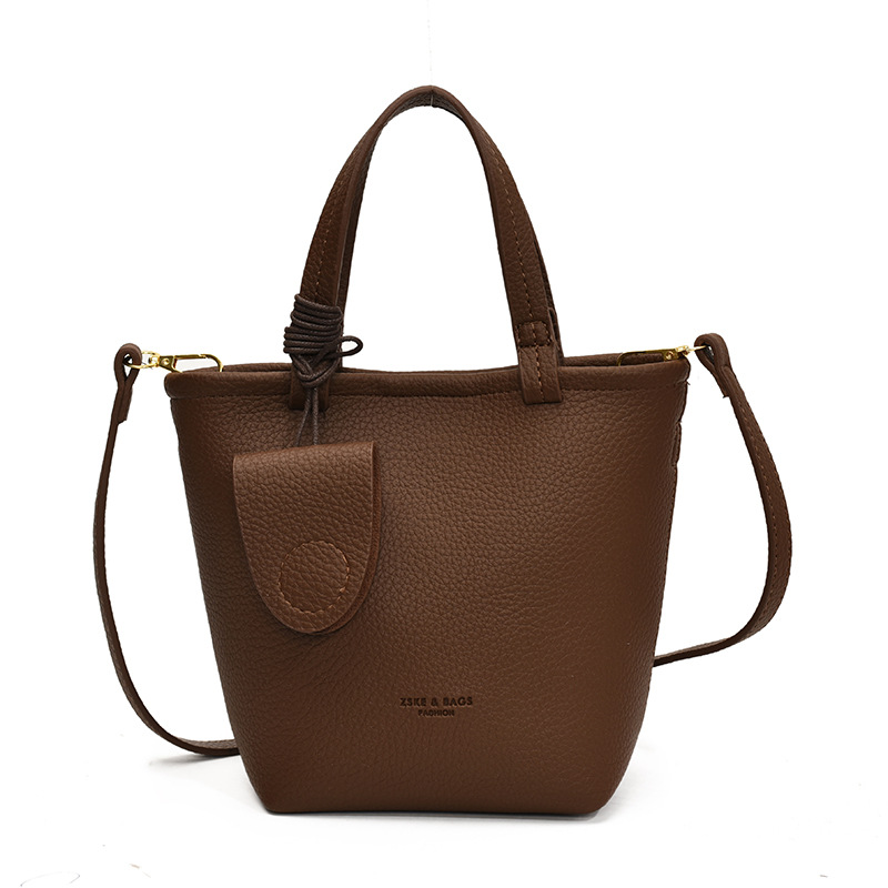 Lichi coreano bolso de cubo portátil para mujeres 2025 nuevo estilo transfronterizo simple canasta de verduras versátil bolso de hombro