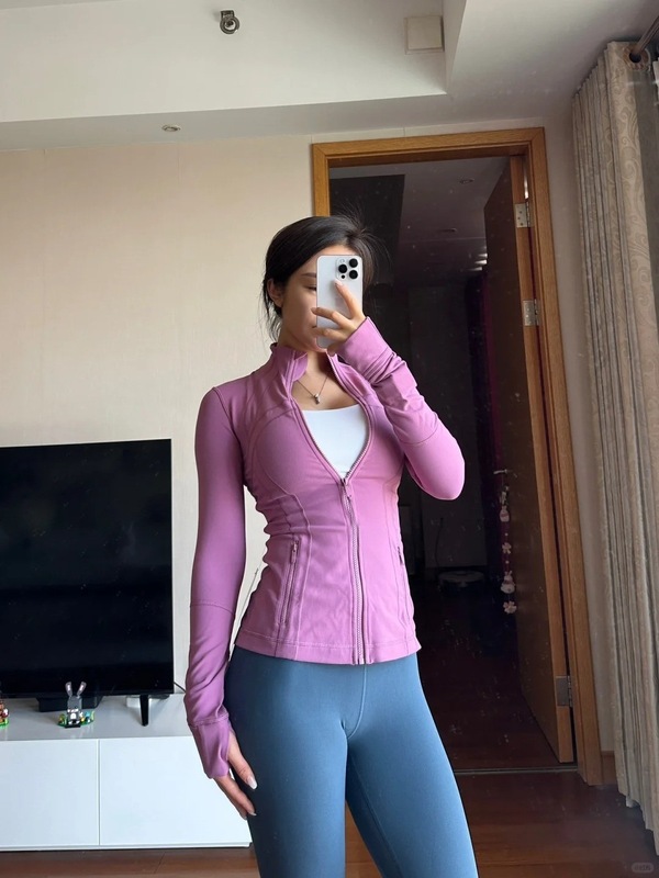 スポーツの女性の金のジッパーのシリーズのヨガの服の女性のジャケットの通気性のスポーツの上着の長袖のフィットネスの服のコート|undefined