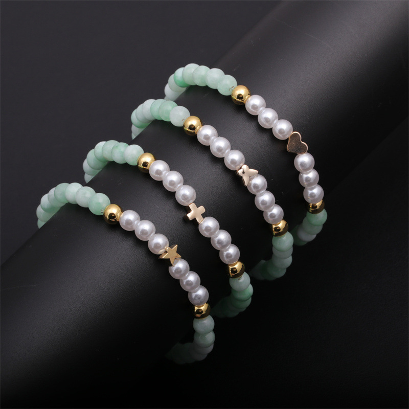 Europa y América transfronteriza 6mm rosa cristal pulsera de cuentas de cobre Cruz amor imitación perla pulsera de cuentas