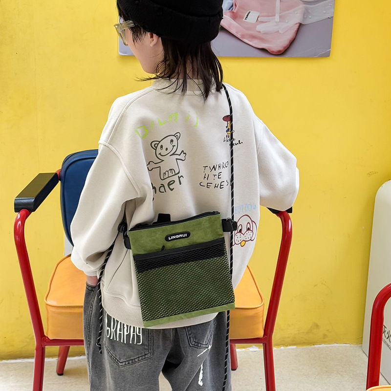 Bolso para niños coreano 2025 nueva moda moda cool bebé mochila accesorios para niños fuera mochila