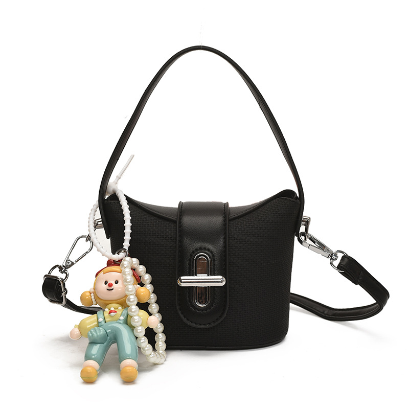 Bolso de hombro para niña de moda, muñeca linda, bolso de bebé colgante, nuevo mini bolso para niños 2025
