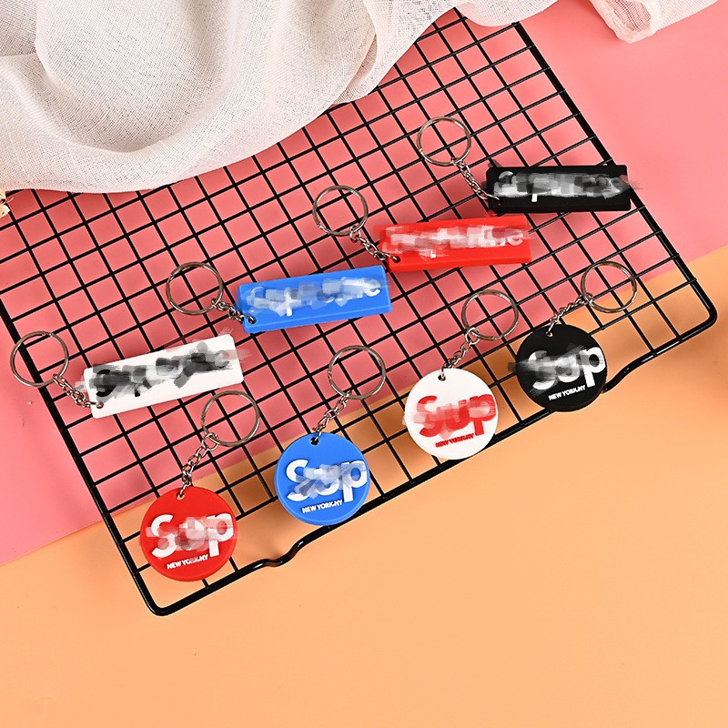 Trendy brand SUP key chain leather rope buckle men's and women's Korean creative personality car key chain pendant spot wholesale Trendy brand SUP key chain leather rope buckle men's and women's Korean creative personality car key chain pendant spot wholesale