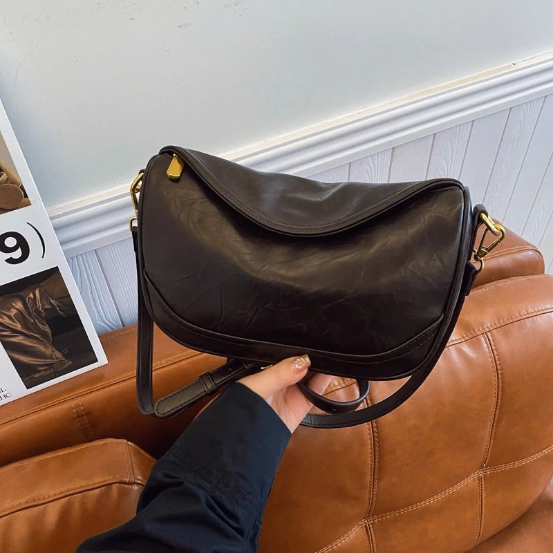 早秋新款乌木女包通勤百搭爆款斜挎包腋下包时尚饺子小众单肩包包