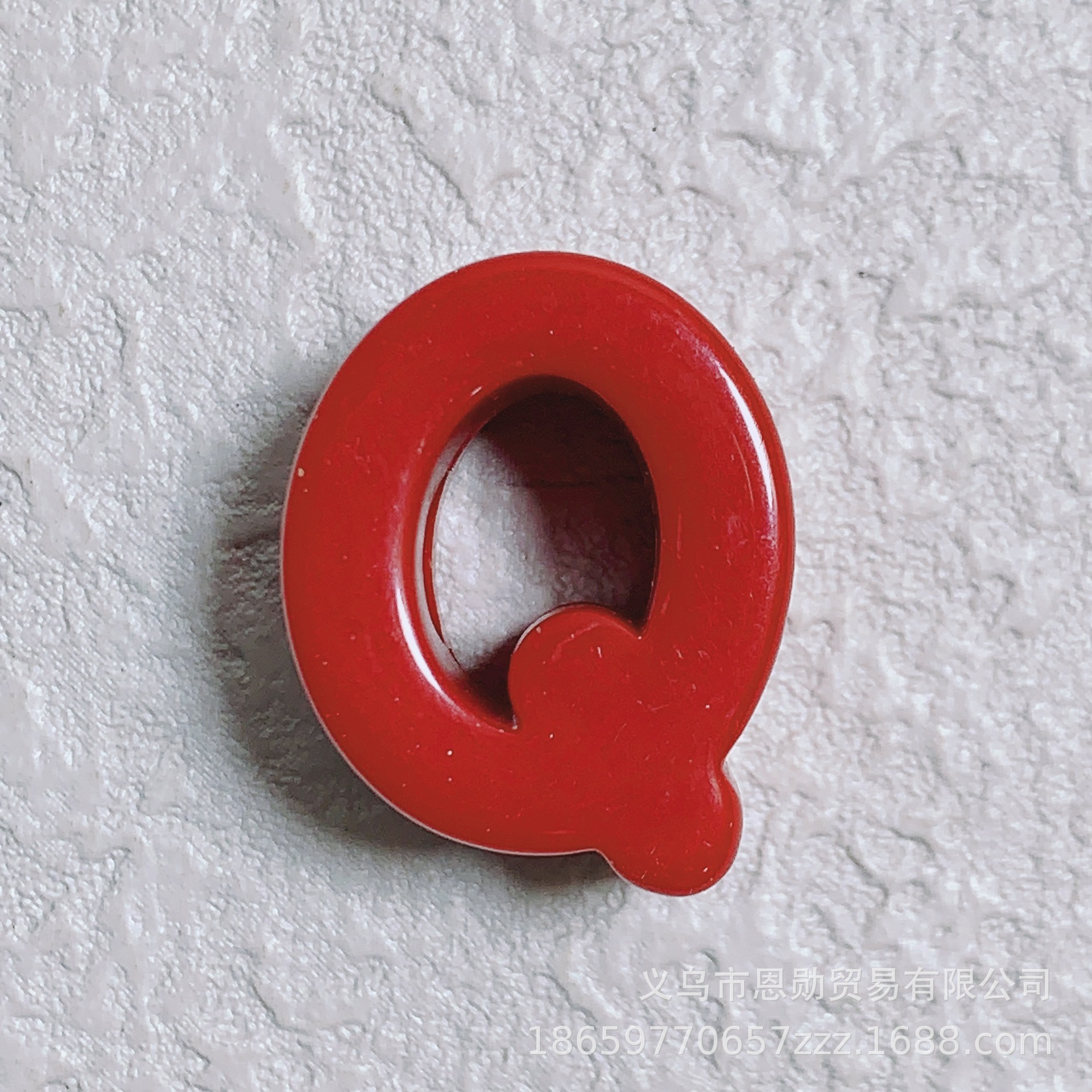 Q (Red)