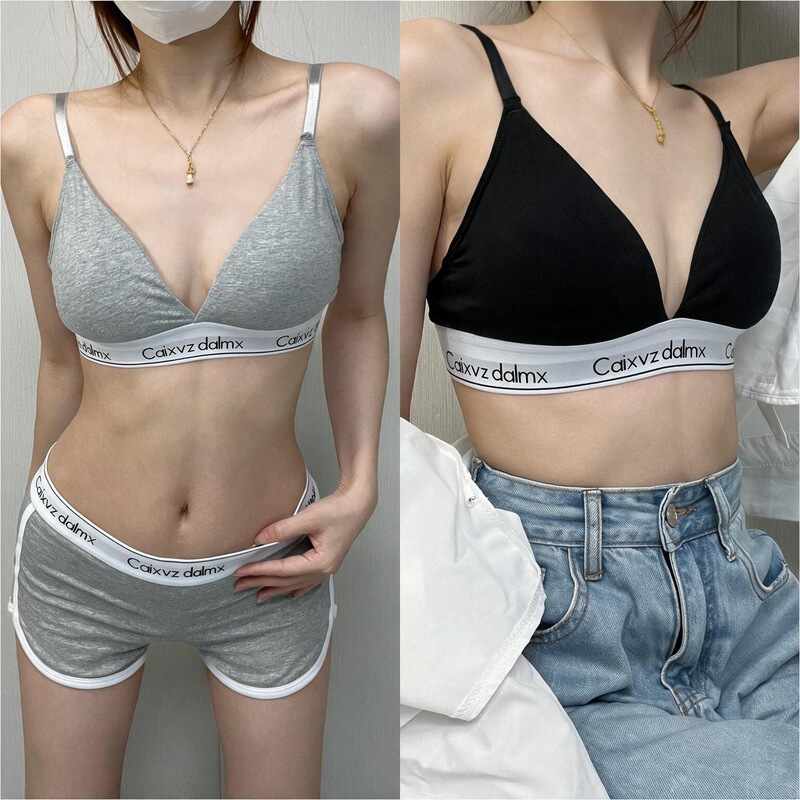 Caixvz letter-printed sports bra set for women, featuring a wireless, triangle-cup bra, a stylish back design, and matching shorts, in a trendy, edgy style