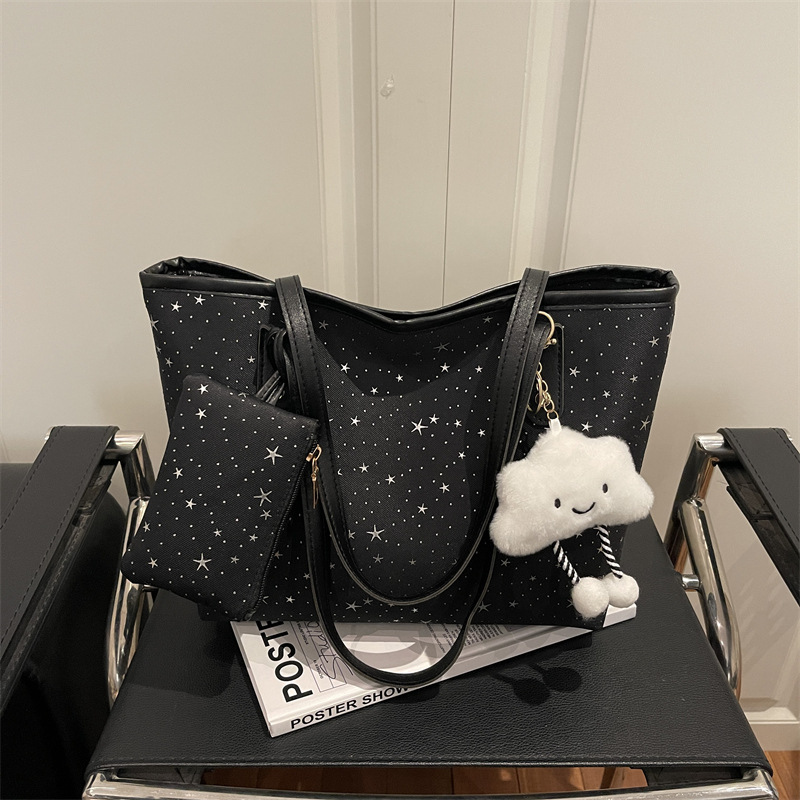 2026 primavera nueva bolsa de hombro de gran capacidad bolsa de brazo universal tendencia transfronteriza dulce viento bolso de mano bolso de mujer