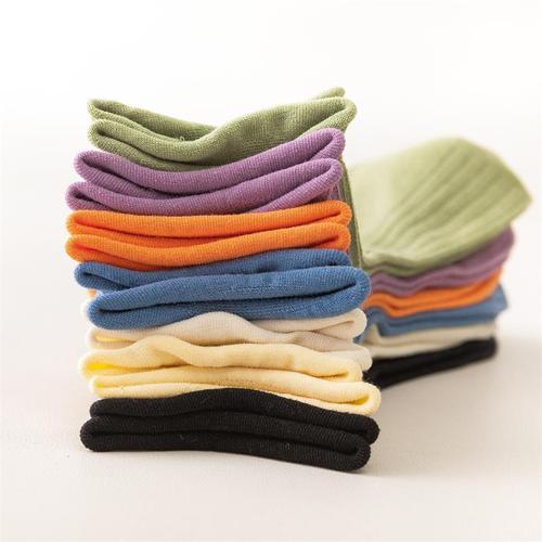 Summer trendy women's solid color vertical stripe mid-calf socks, candy color tassel socks with rolled edges, simple and elegant.