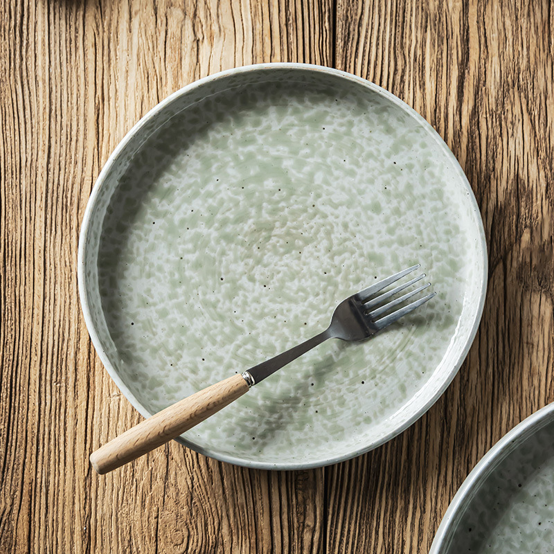 Platos de cerámica en relieve retro de alto valor de cara de filete casero, plato de pasta, plato de fruta práctico, plato de postre