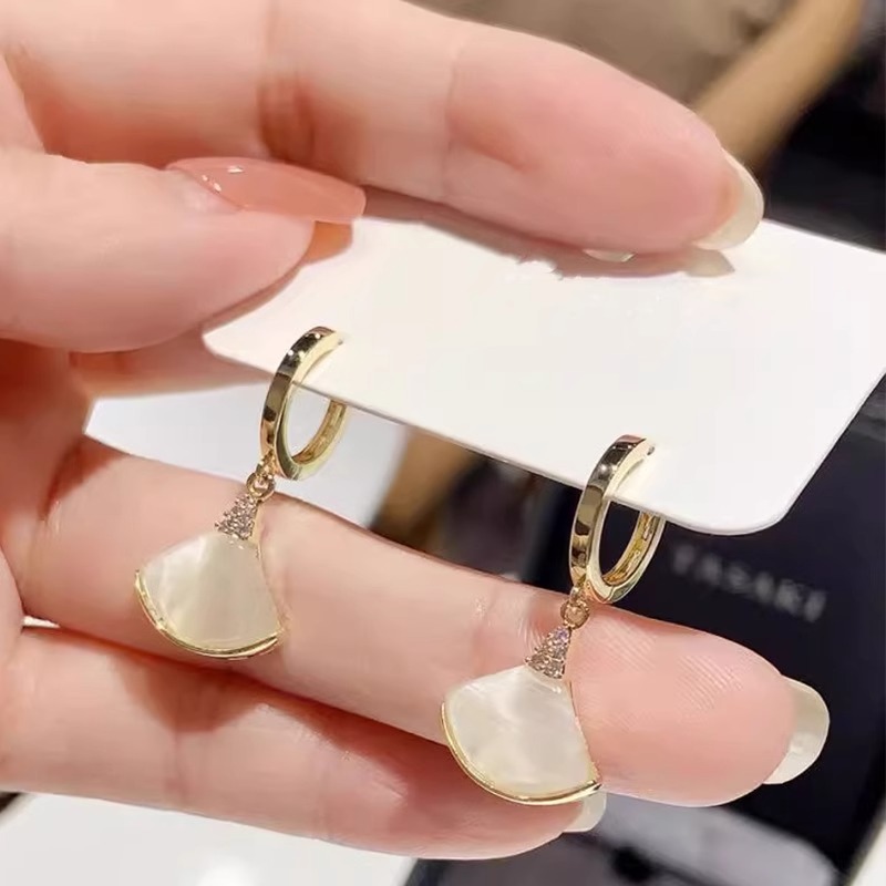 Golden design earrings