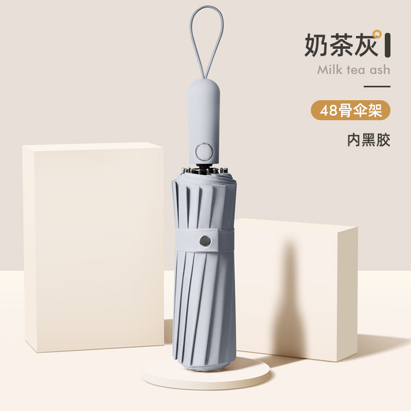 Una gran cantidad de paraguas plegables automáticos al por mayor, paraguas de sol de gran tamaño para mujer, sombrilla de sol para hombre, publicidad personalizada