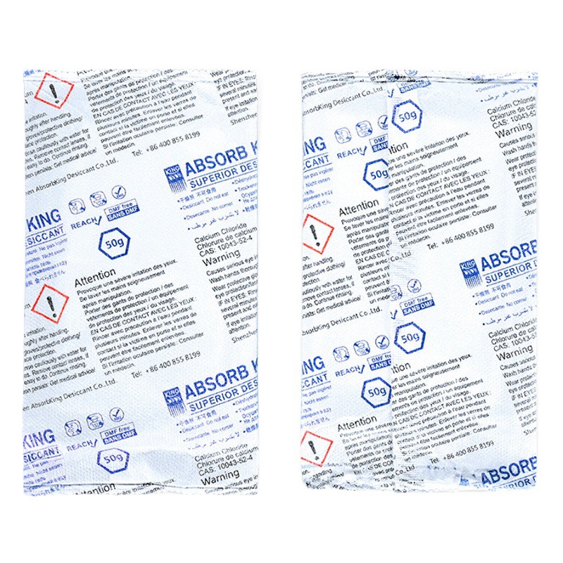 Venta directa de fábrica de desecante de cloruro de calcio, absorbente de humedad, antimoho y a prueba de humedad, empaque de tela no tejida de cloruro de calcio de doble capa, venta al por mayor en stock.