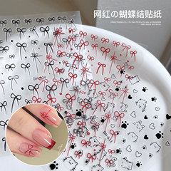 ネットの赤い爆発の蝶結びのネイルシールのかわいい猫の線のシールの赤い蝶結びの爪は卸売りを飾ります。