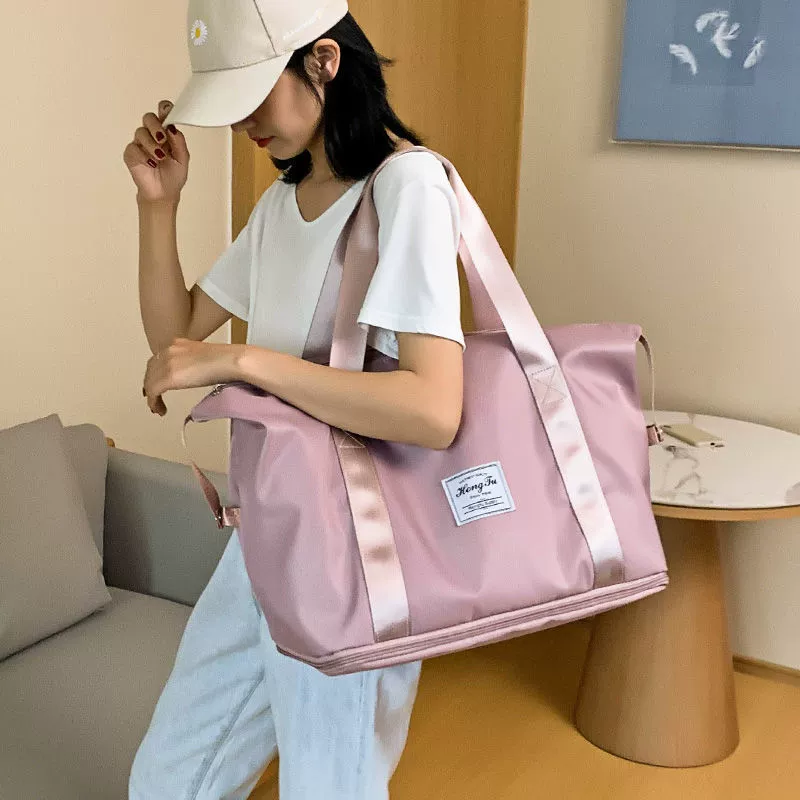Capacious fashionable luggage travel bag to go out, worn on the shoulder