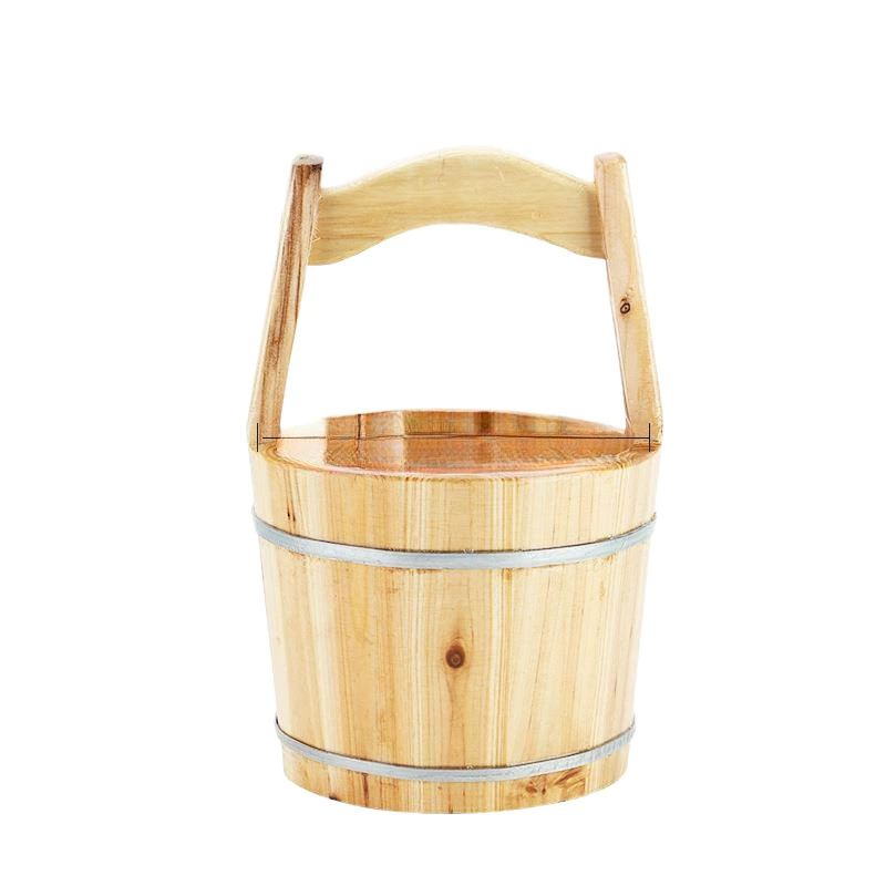 Old-fashioned wooden bucket, handheld spoon