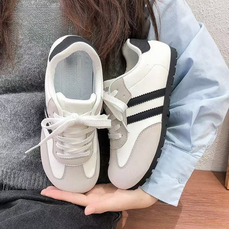 Mujeres 2026 primavera y otoño nuevo estilo de estilo de campus zapatos casuales de fondo plano de moda zapatos blancos de cabeza redonda de verano transpirables