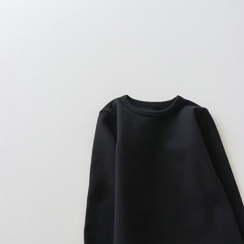 Camiseta de manga larga de algodón puro para niños 2026, camiseta básica para primavera y otoño, top cepillado de cuello redondo de color liso y corte holgado para niños y niñas.