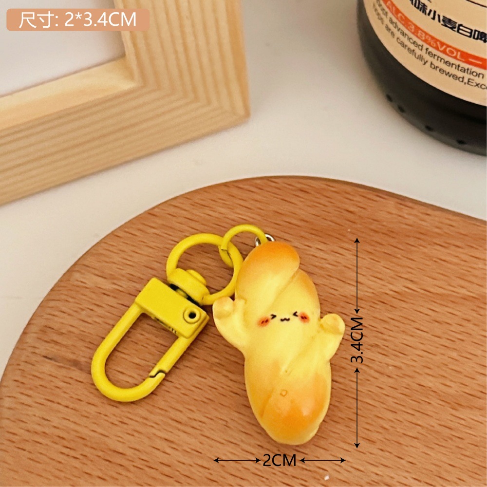 Creativo lindo pan tostado comida jugar colgante llavero accesorios pequeños juegos de chicas corazón interesante pequeño regalo al por mayor