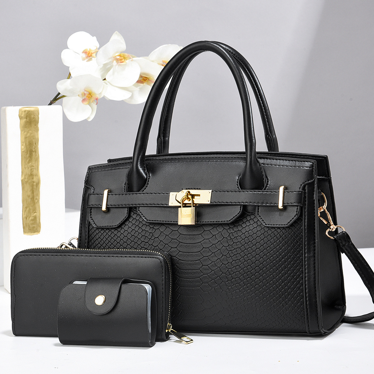 Taizhou bolsos de mujer bolsos grandes bolsos de tres piezas bolsos de cerradura colgante bolsos de comercio exterior
