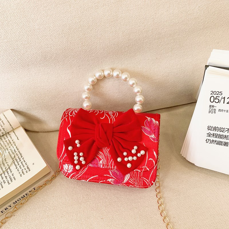 2025 rojo festivo bolso de Año Nuevo para niños estilo occidental perla bolso de niña hilo bordado bowknot bandolera para niños