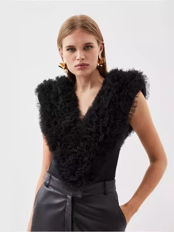 Europa y América Primavera/Verano Maillard Tops ajustados de alta gama Diseño femenino Cuello en v Tops de malla hinchada Estilo de temperamento de mujer image 4
