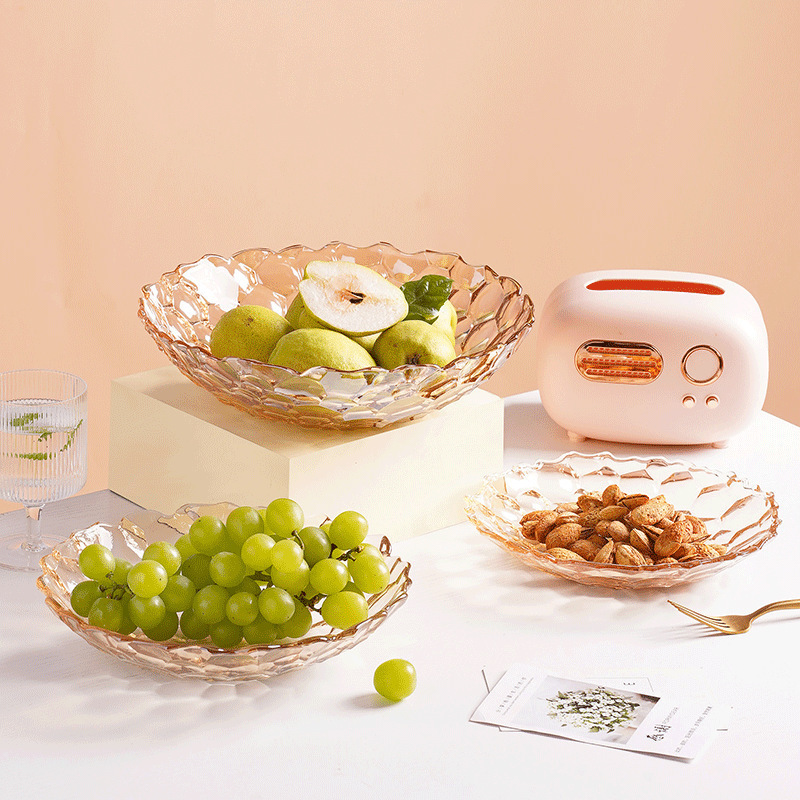 Plato de frutas de lujo ligero plato de frutas de vidrio creativo mesa de té de sala de estar doméstica moderna plato de frutas secas semillas de melón dulces platos de bocadillos