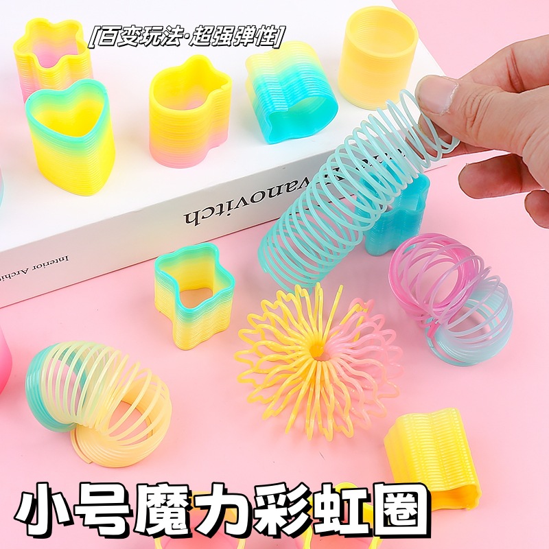 Heart-shaped magic rainbow ring mini spring ring telescopic stacking elastic ring to push hot selling small toys gifts wholesale