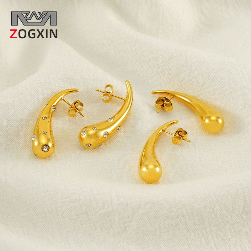 Moda europea y americana diseño personalizado pendientes en forma de gota de acero inoxidable chapado 18K oro diamante incrustado luz lujo ins estilo pendientes de las mujeres