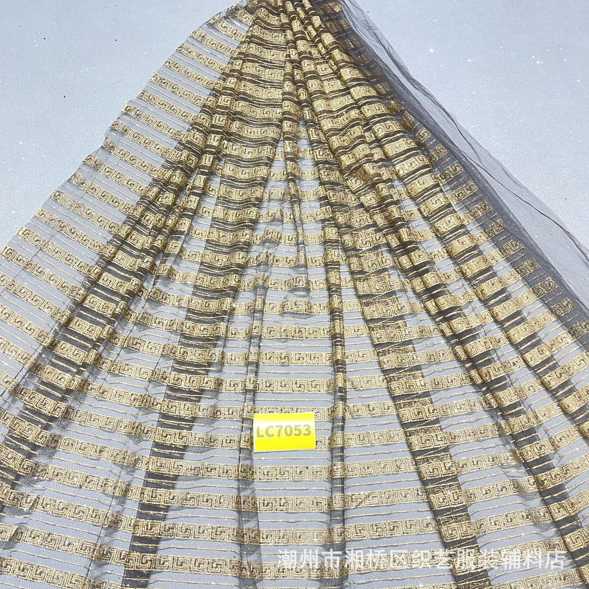 LC7053款单色10码起订 喷金婚纱晚礼服面料洒金婚礼服网眼布