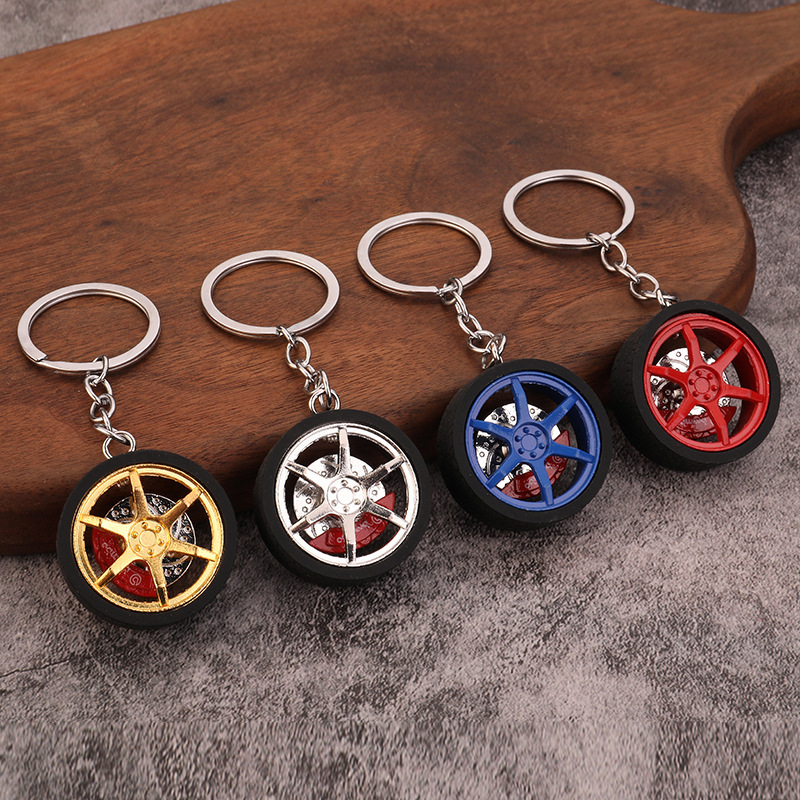 Foreign trade hot selling car modification caliper brake disc wheel hub car keychain tire metal tire keychain Foreign trade hot selling car modification caliper brake disc wheel hub car keychain tire metal tire keychain
