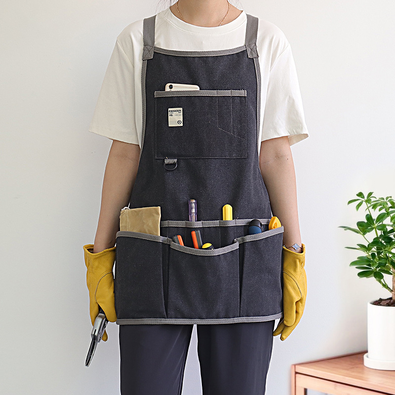 Nuevo delantal de lona gruesa transfronteriza logotipo personalizado floral jardinería ropa de trabajo electricista carpintería herramientas de almacenamiento delantal