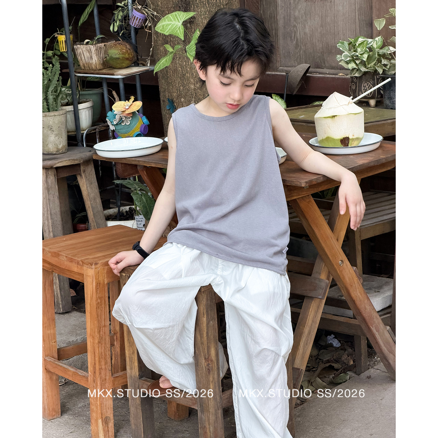 Ropa infantil chaleco para niños camiseta sin mangas para niños verano 2026 nuevo estilo coreano para niños camiseta transpirable ligera y casual