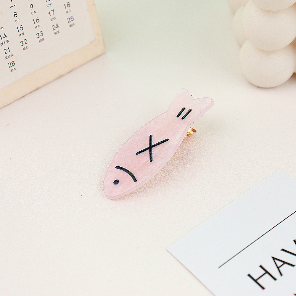 분홍색과 검은 물고기