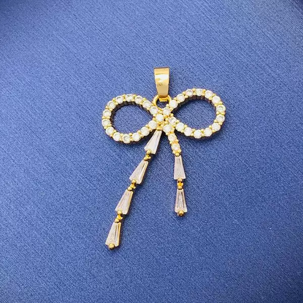 With bow, golden, micro incrustation