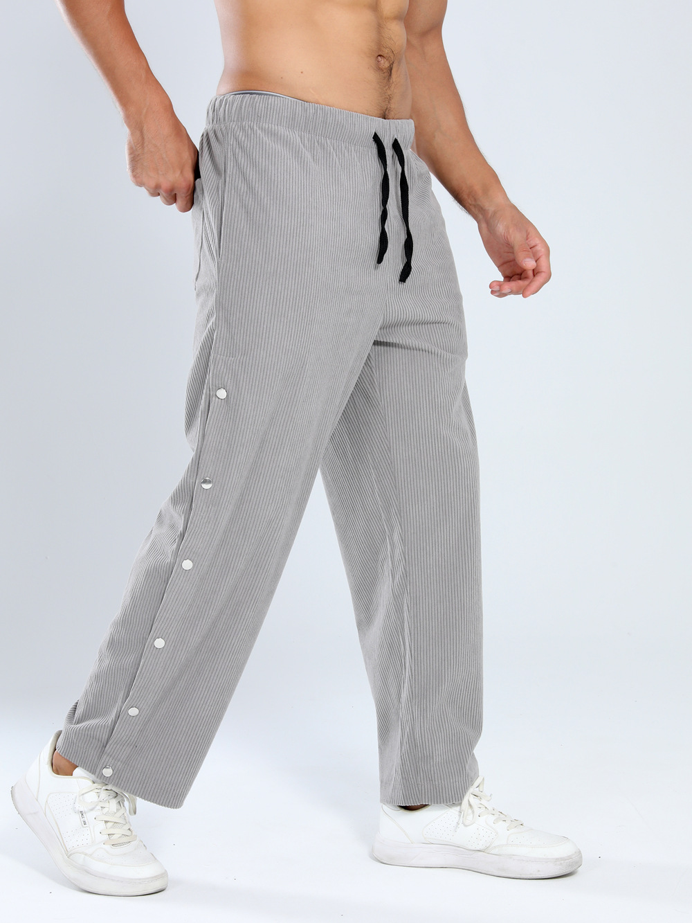 Músculos locos nuevos pantalones largos masculinos de primavera y otoño retro americano rayas verticales relajadas pantalones casuales de pecho suelto en todas las fronteras