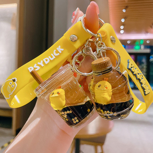 Internet celebrity Kodak Duck key chain filled with oil floating cartoon doll key chain quicksand bottle pendant exquisite gift wholesale