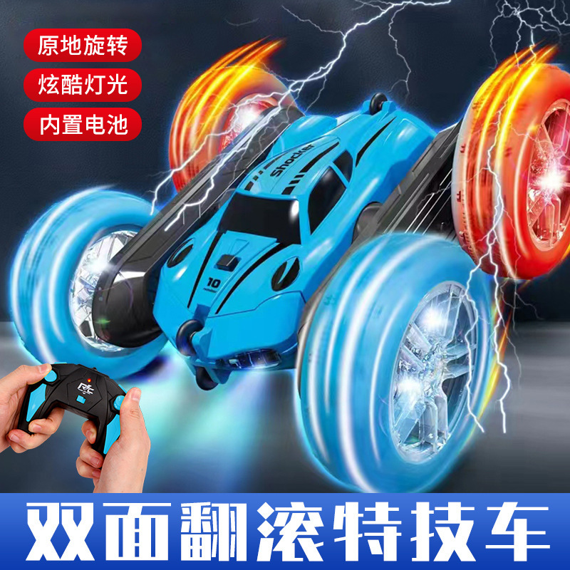 La nueva deriva de tracción en las cuatro ruedas de 2.4G, conducción de doble cara, brazo oscilante, coche volquete, luz fresca, coche de control remoto para niños, juguete