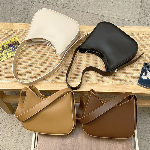 Retro solid color large-capacity fashionable shoulder bag, feminine commuting, this year's popular armpit bag, crossbody tote bag