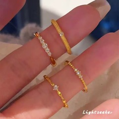銅金メッキ大東門細閃石指輪の女性タイプの韓国系日常百合食指戒手飾りは極めてシンプルです。