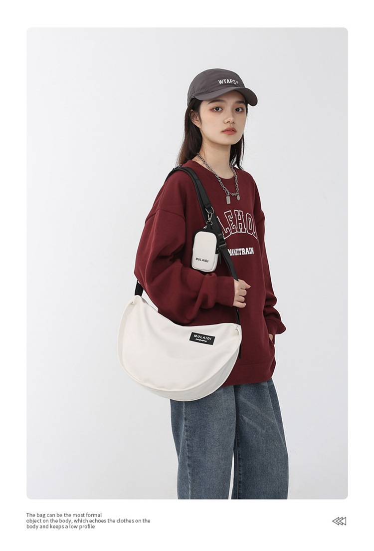Japanese-style casual dumpling bags, sporty crossbody bags, large-capacity canvas bags for women, single-shoulder commuting bags for students to class, trendy Item Picture