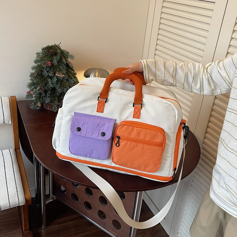 Large-capacity portable travel bag, short-trip travel tote bag, waterproof carry-on sports bag, gym bag wholesale.